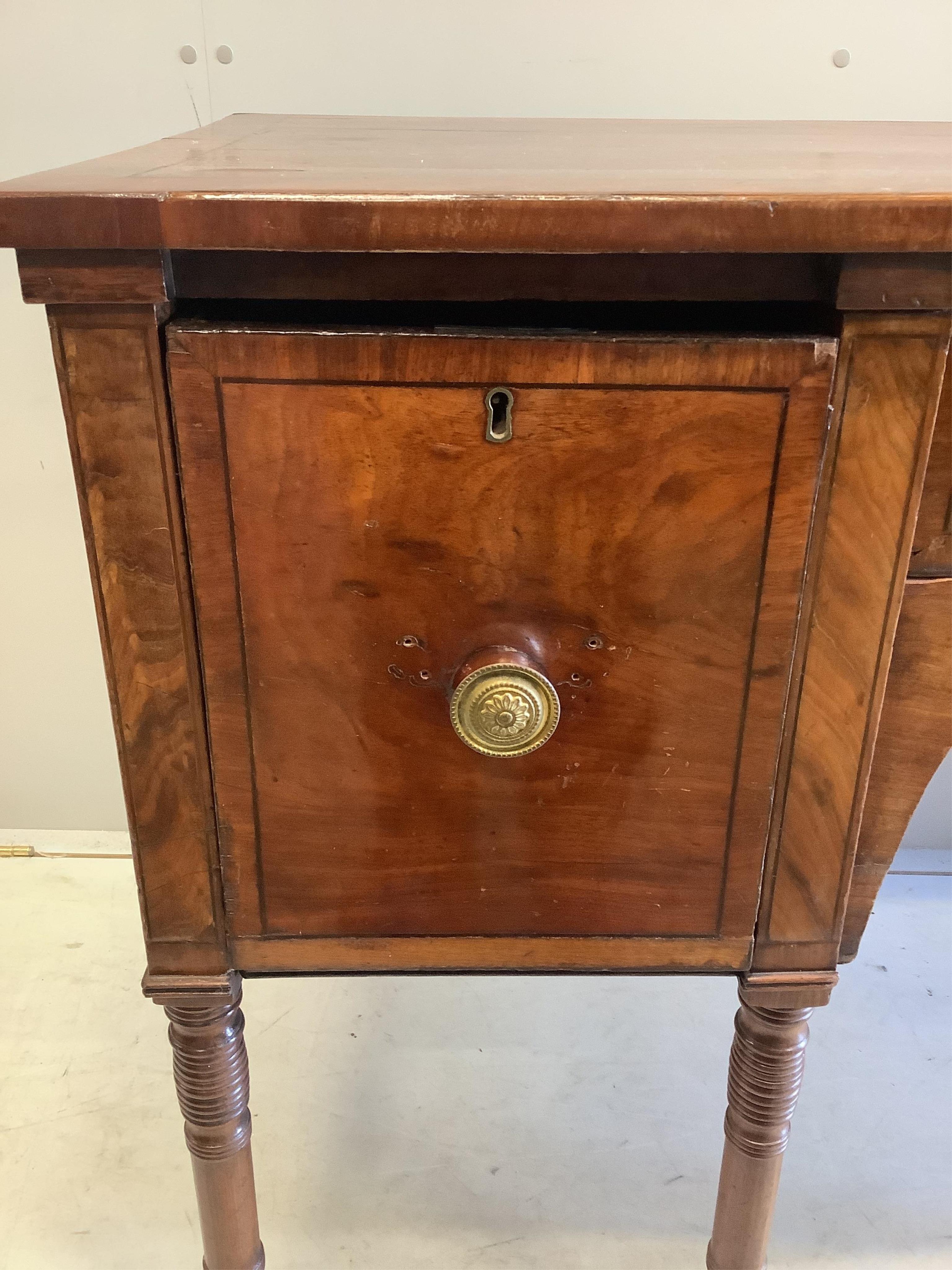 A Regency mahogany sideboard, width 137cm, depth 60cm, height 84cm. Condition - poor